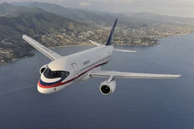hyh 9993 air to air photo of a sukhoi superjet 100 97004 ov